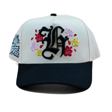 Load image into Gallery viewer, H “Hibiscus” Black/Cream SnapBack
